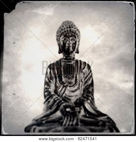 Instagram vintage filtered image of a Buddah