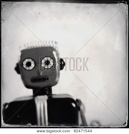 Instagram filtered image of an old toy robot