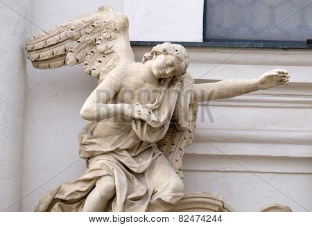 GRAZ, AUSTRIA - JANUARY 10, 2015: Angel on the portal of Mariahilf church in Graz, Styria, Austria on January 10, 2015.