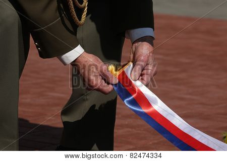 PRAGUE, CZECH REPUBLIC - MAY 9, 2013: Czech war veteran attends the celebration of Victory Day at the Soviet War Memorial at the Olsany Cemetery in Prague, Czech Republic.