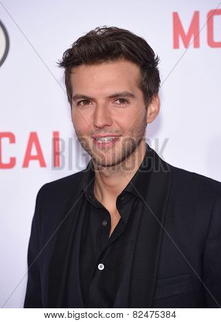 LOS ANGELES - JAN 21:  Guy Burnet arrives to the 