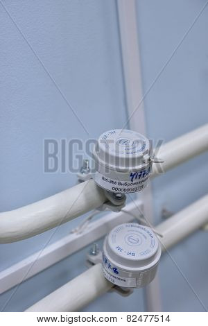 NOVOSIBIRSK, RUSSIA - JANUARY 15, 2015: Vibroacoustic noise generators on the pipeline in the laboratory of information security of the Novosibirsk State University of Economics and Management