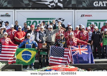 Daytona Beach, FL - Jan 25, 2015:  The Chip Ganasi Racing with Felix Sabetes Riley DP crew celebrates after winning the Rolex 24 at Daytona International Speedway in Daytona Beach, FL.