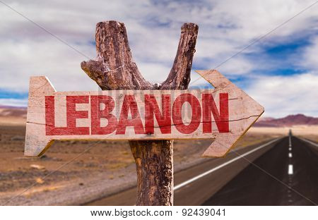 Lebanon wooden sign with desert road background