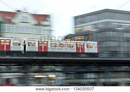 train with speed in motion in the evening