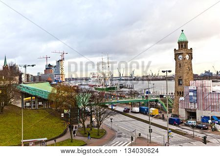 HAMBURG, GERMANY - JUNE 3, 2011: view to Landungsbruecken in Hamburg with river Elbeview to Landungsbruecken in Hamburg with river Elbe