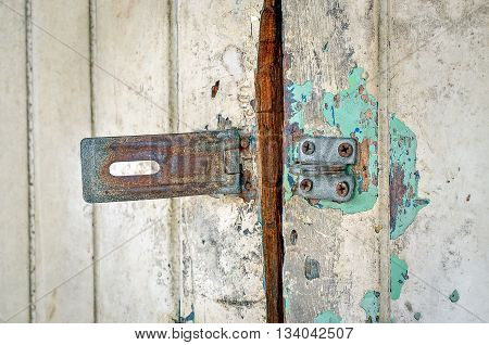 Rusted keyhole on wooden door (keyhole, rusted, door)
