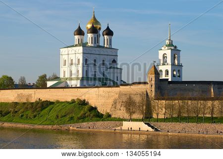 PSKOV, RUSSIA - MAY 07, 2016: Trinity Cathedral and the walls of the Pskov Kremlin at sunset. Historical landmark of the city Pskov