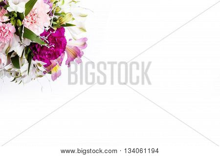 Summer bouquet from pink and purple gillyflowers and alstroemeria on white background