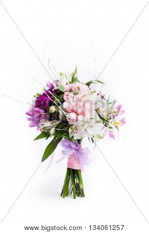 Mother's Day bouquet from pink and purple gillyflowers and alstroemeria on white background