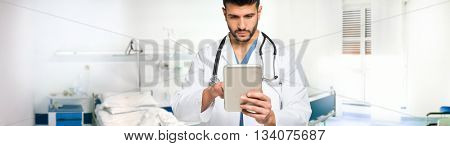 Ultrawide image of a doctor using his digital tablet