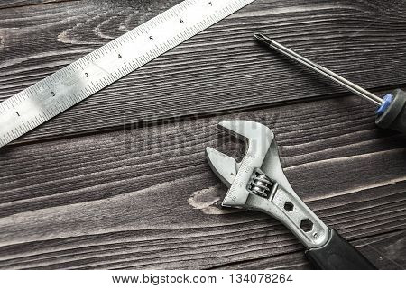 Tools On The Wooden Rustic Background