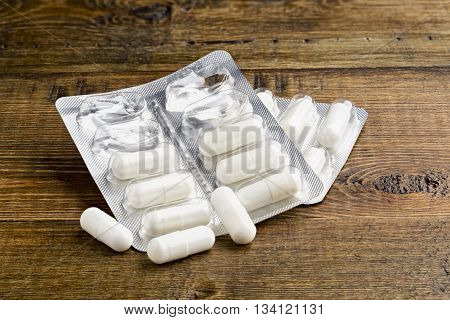 Meldonium doping for athletes. Abuse of anabolic steroids for sports.Blister pack of meldonium capsules