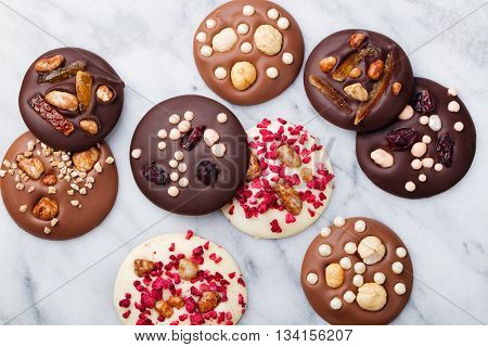 Luxury handmade chocolate mediants, cookies, bites, candies. Traditional french Christmas dessert Copy space Top view