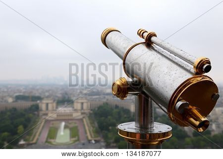 PARIS, FRANCE - JUNE 8, 2013:Spyglass on the Eiffel Tower