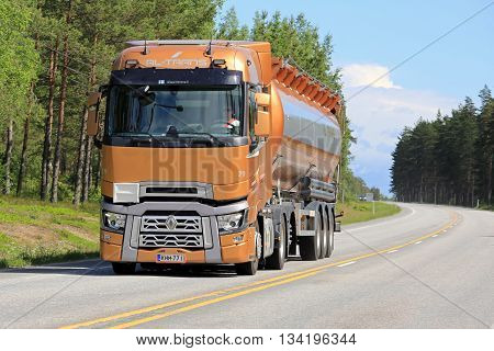 RAASEPORI, FINLAND - JUNE 5 2016: New orange Renault Trucks T semi tanker on the road in South of Finland at summer.
