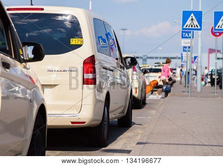 BERLIN / GERMANY - JUNE 4 2016: german taxi cars stands on airport schoenefeld berlin / germany at june 4 2016.