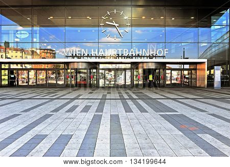VIENNA AUSTRIA - JUNE 6: Main railway station of Vienna with the german sign «Vienna train station» on June 6 2016. Vienna is the capital and largest city of Austria.
