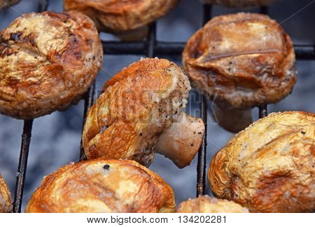 White Champignons Mushrooms On Grill