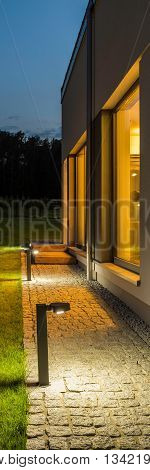 Villa Backyard Illuminated At Night