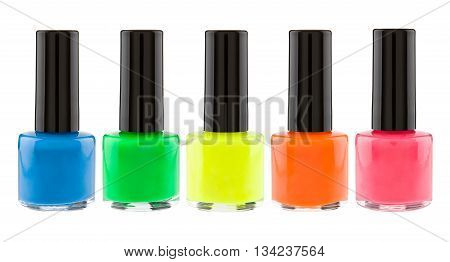 Set of neon colorful nail polish isolated on white