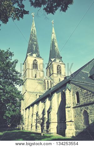 Church of Saint Nicholas (St. Nikolai-Kirche) in Quedlinburg, Germany. Retro style filtered image