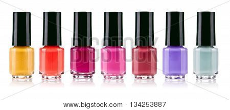Set of colorful nail polish isolated on white