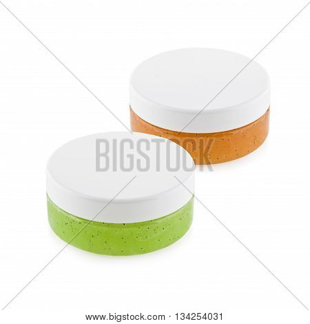 orange and green body scrub isolated on white background
