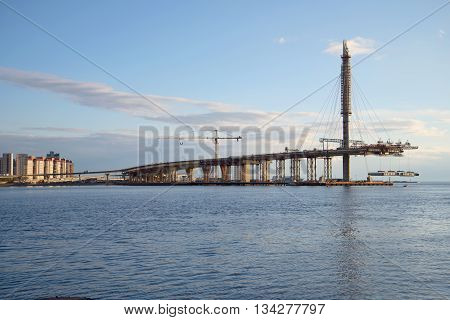 SAINT PETERSBURG, RUSSIA - APRIL 23, 2016: A view of the construction of the WHSD Central section in the area of Vasilievsky island, april evening