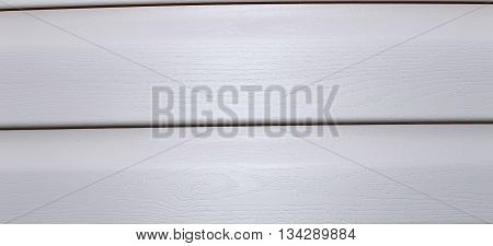Background of Installed on the facade of house panels beige vinyl siding