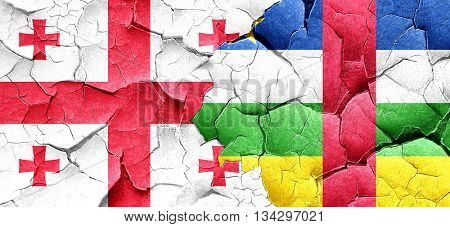 Georgia flag with Central African Republic flag on a grunge crac