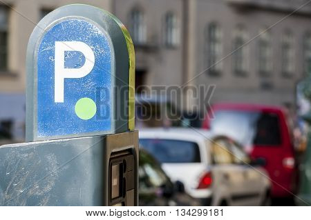 Automatic charge a fee for parking paid parking for cars in city. Parking fees.