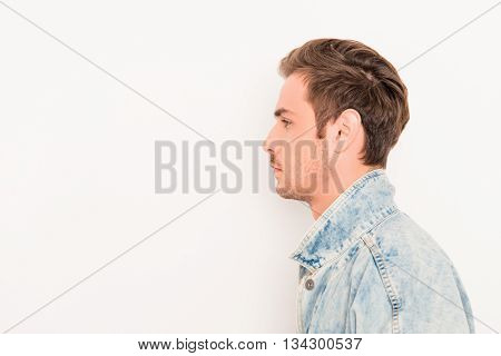 Side View Of Young Hansome Man Isolated On White Background
