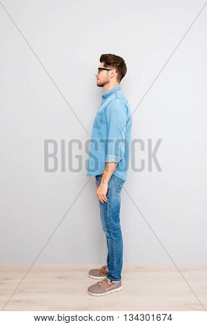 Side View Of Young Trendy Handsome Man In Glasses