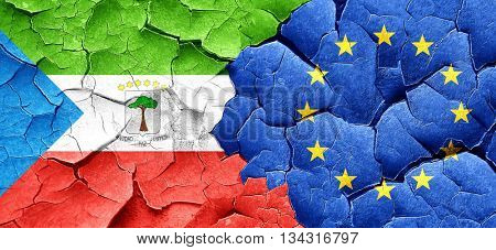 Equatorial guinea flag with european union flag on a grunge crac