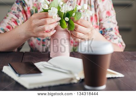 Coffee To Go. White Flowers On The Rustic Background.