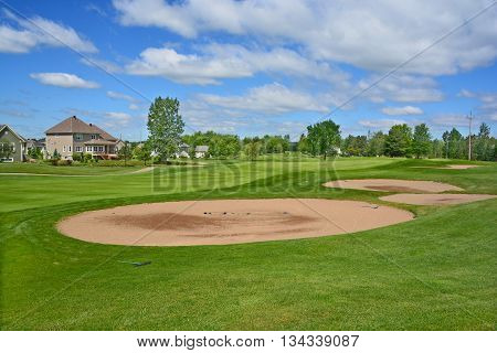 BROMONT QUEBEC CANADA 06 14 2016: Designed in 1992 by famous Graham Cooke, The Royal Bromont Golf Club offers an exceptional view of the surrounding mountains right in the heart of the City of Bromont