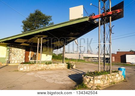 And old Gas Station withers away with no tennant in the metropolis