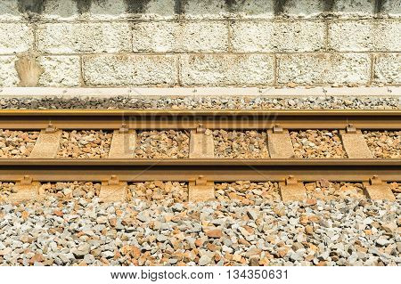 Railway with concrete wall on backgournd, Japan