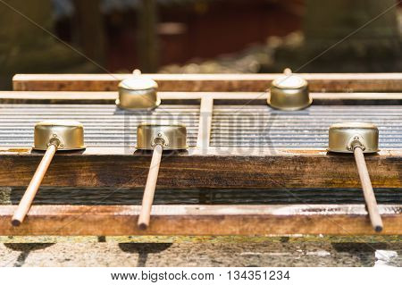 Japanese dippers for holy water in Japan, selective focus