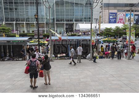 BANGKOK THAILAND - MAY 22 : group of people at bus stop in front of Big C Supercenter in Ratchaprasong area on may 22 2016 thailand. Ratchaprasong is one of is famous landmark of Bangkok