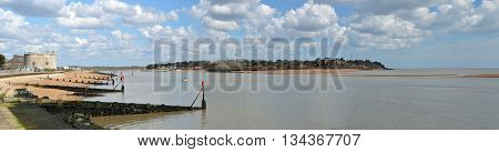 Panorama of the Estuary of the river Deben at Felixstowe Ferry with Martello tower and Bawdsey Manor in the background.