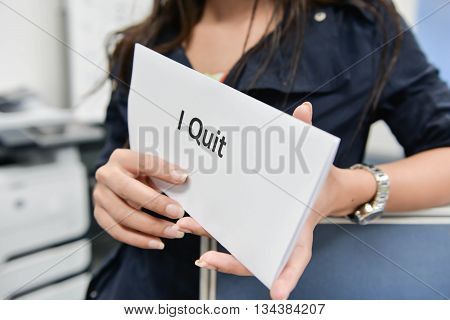 I Quit - Business Woman Is Showing The Document For Resignation For Quit The Job