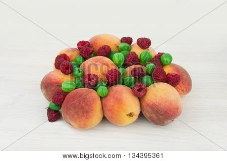 Assortment of juicy fruits on wooden background