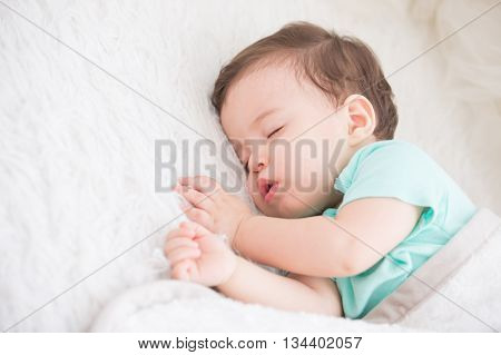 Newborn cute baby sleeping. Closeup portrait caucasian child