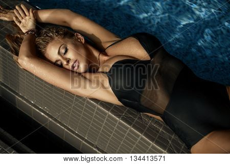 Sexy Blonde Girl Sunbathing.