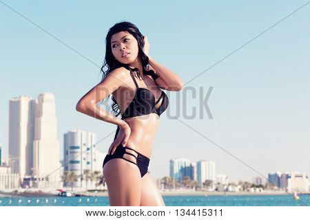 Sexy tourist girl in Dubai city beach