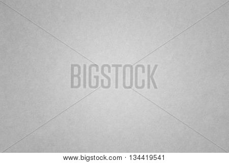 closeup surface detail of old gray (grey) paper texture background use for backdrop or design element in education or business concept