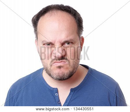 angry middle aged man with madman grimace