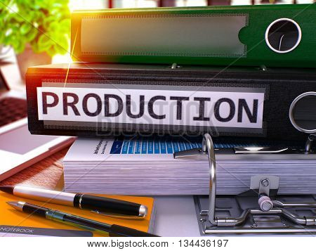 Black Office Folder with Inscription Production on Office Desktop with Office Supplies and Modern Laptop. Production Business Concept on Blurred Background. Production - Toned Image. 3D.